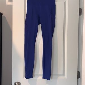 Lightly worn blue leggings by Fabletics